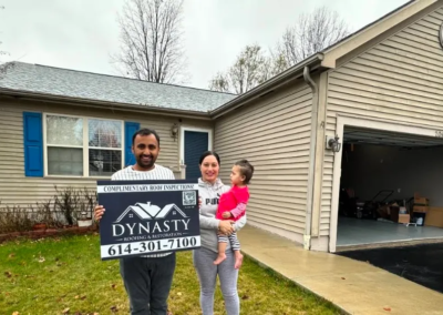 a columbus homeowner in front of their house with new roof