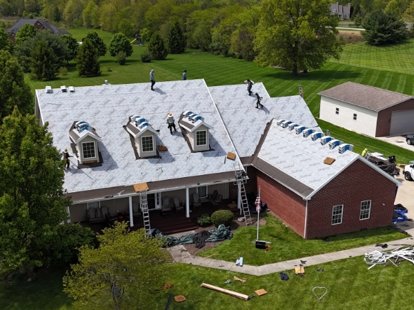aerial view of a roof being replaced