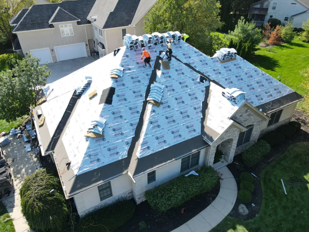 roofing-contractor-pickerington-00003 drone shot of a roof being replaced in pickerington, ohio